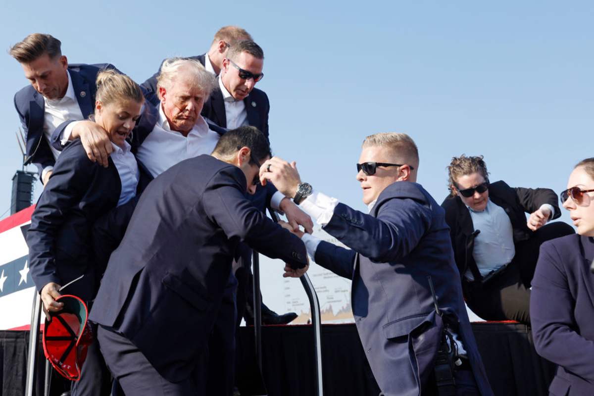 Donald Trump is rushed offstage during a rally on July 13, 2024 in Butler, Pennsylvania. (Image Source: Photo by Anna Moneymaker/Getty Images)