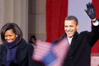 Barack and Michelle Obama (L)