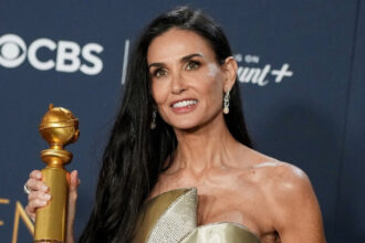 Demi Moore With Award for Best Actress in Motion Picture Musical or Comedy at Globes 2025.