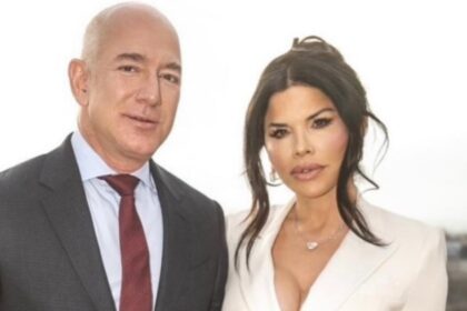 Jeff Bezos and Lauren Sanchez posing for a photo