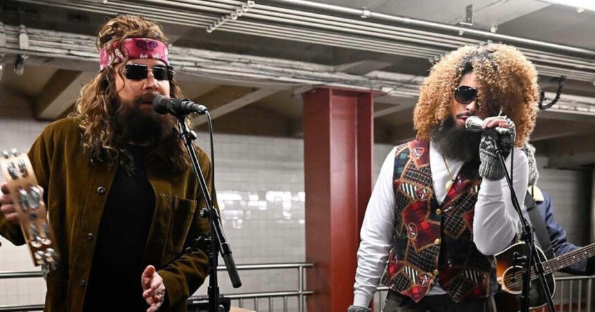 Jimmy Fallon (L) and Bad Bunny perform at a subway station in New York.