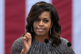 Michelle Obama speaking with supporters of former Secretary of State Hillary Clinton.