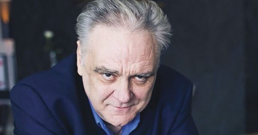 Tony Slattery, credits via Instagram (@tony_slattery_official_).